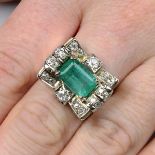 A mid 20th century emerald and diamond dress ring.