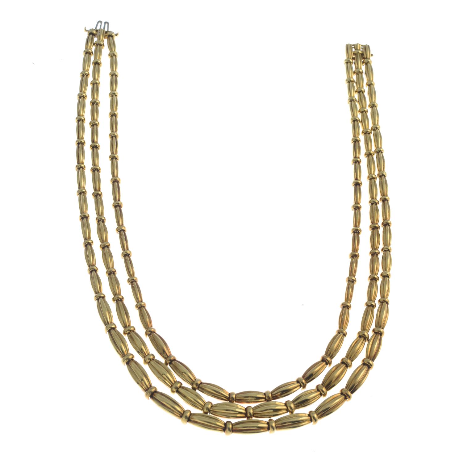 A grooved link, three-strand necklace, by Tiffany & Co.Stamped 750. - Image 2 of 5