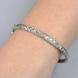 An old-cut diamond line hinged bangle.