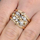 An 18ct gold 'brown' diamond and brilliant-cut diamond dress ring.Estimated total diamond weight