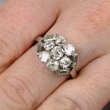 A mid 20th century vari-cut diamond floral cluster ring.Estimated total diamond weight 2.30cts,