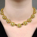 An early 19th century high carat gold turquoise cannetille necklace.Length 41cms.