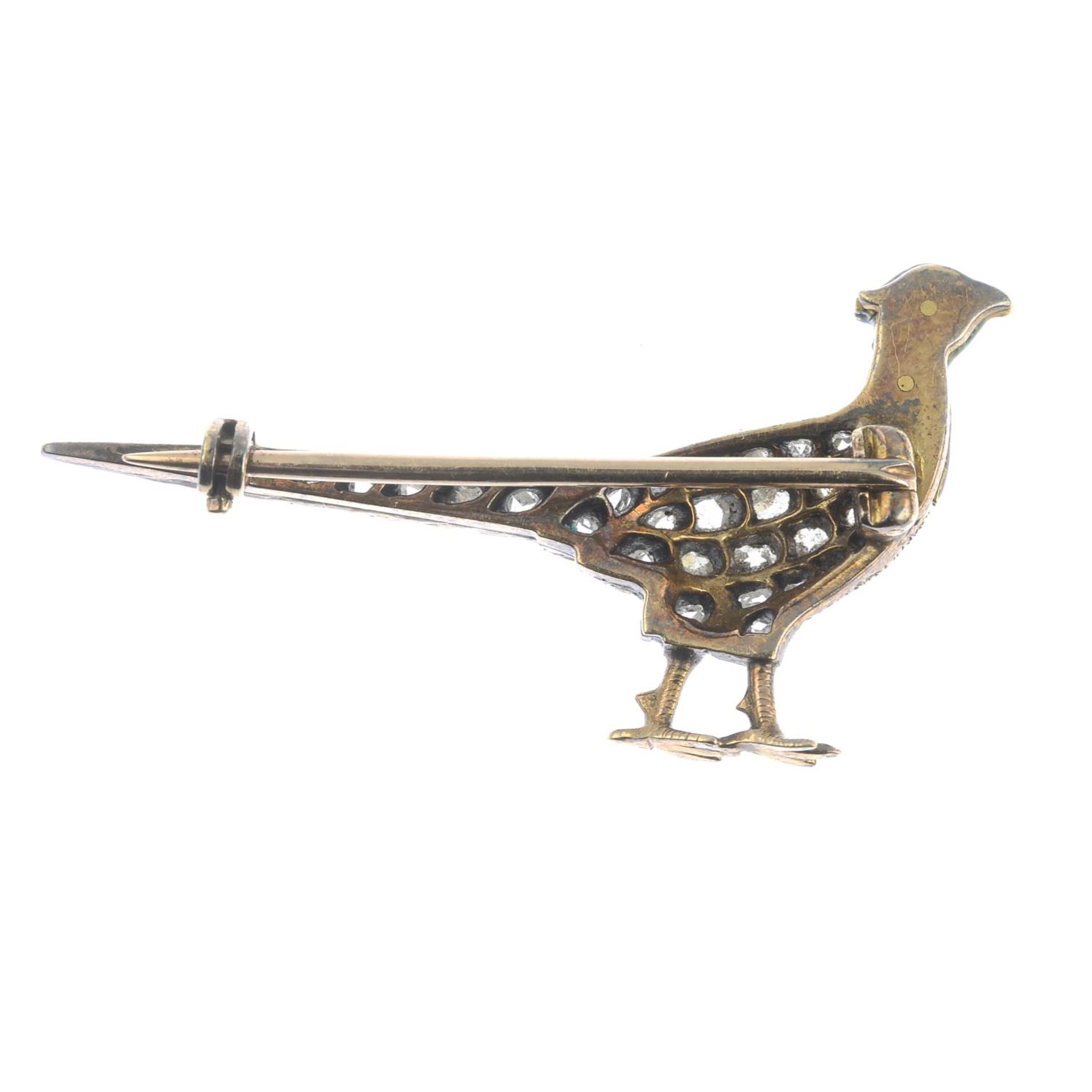 A late Victorian, silver and gold, pave-set diamond and enamel pheasant brooch.Length 3.9cms. - Image 2 of 3