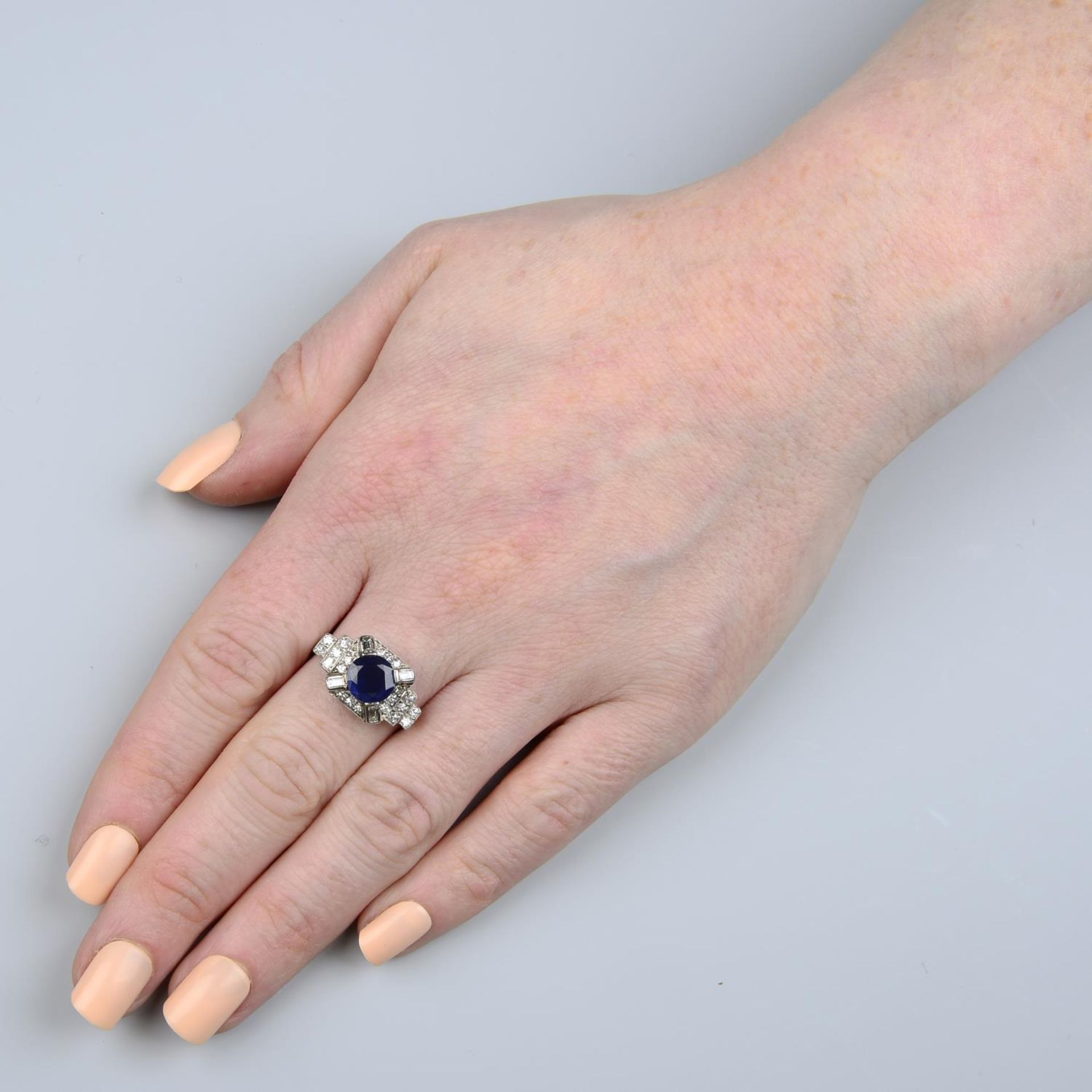 An Art Deco platinum sapphire and vari-cut diamond dress ring.Sapphire calculated weight 2.07cts, - Image 5 of 5