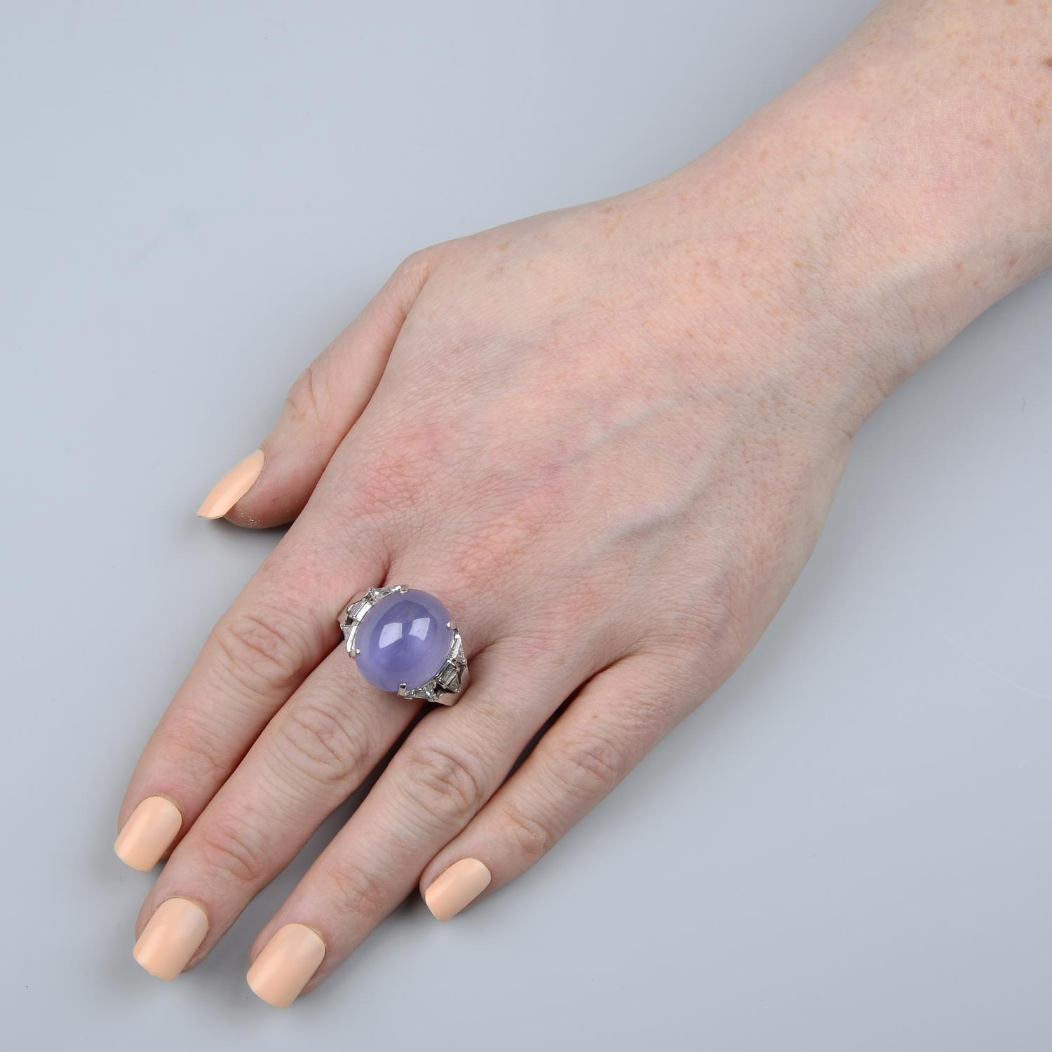 A star sapphire cabochon ring, with vari-cut diamond shoulders. - Image 6 of 6