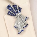 A mid 20th century platinum sapphire and diamond bow brooch.