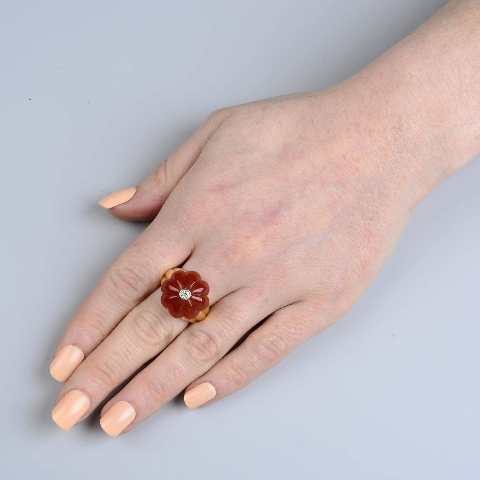 An 18ct gold diamond and carved carnelian floral dress ring.Hallmarks for London, 2015. - Image 5 of 5