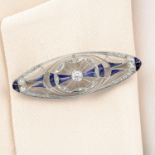 A mid 20th century platinum vari-cut diamond and sapphire brooch.Principal diamond estimated weight