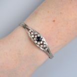 A mid 20th century sapphire and brilliant-cut diamond textured bracelet.Estimated total diamond