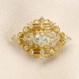 A late 19th century 18ct gold old-cut diamond openwork brooch.