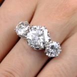 An impressive brilliant-cut diamond three-stone ring.