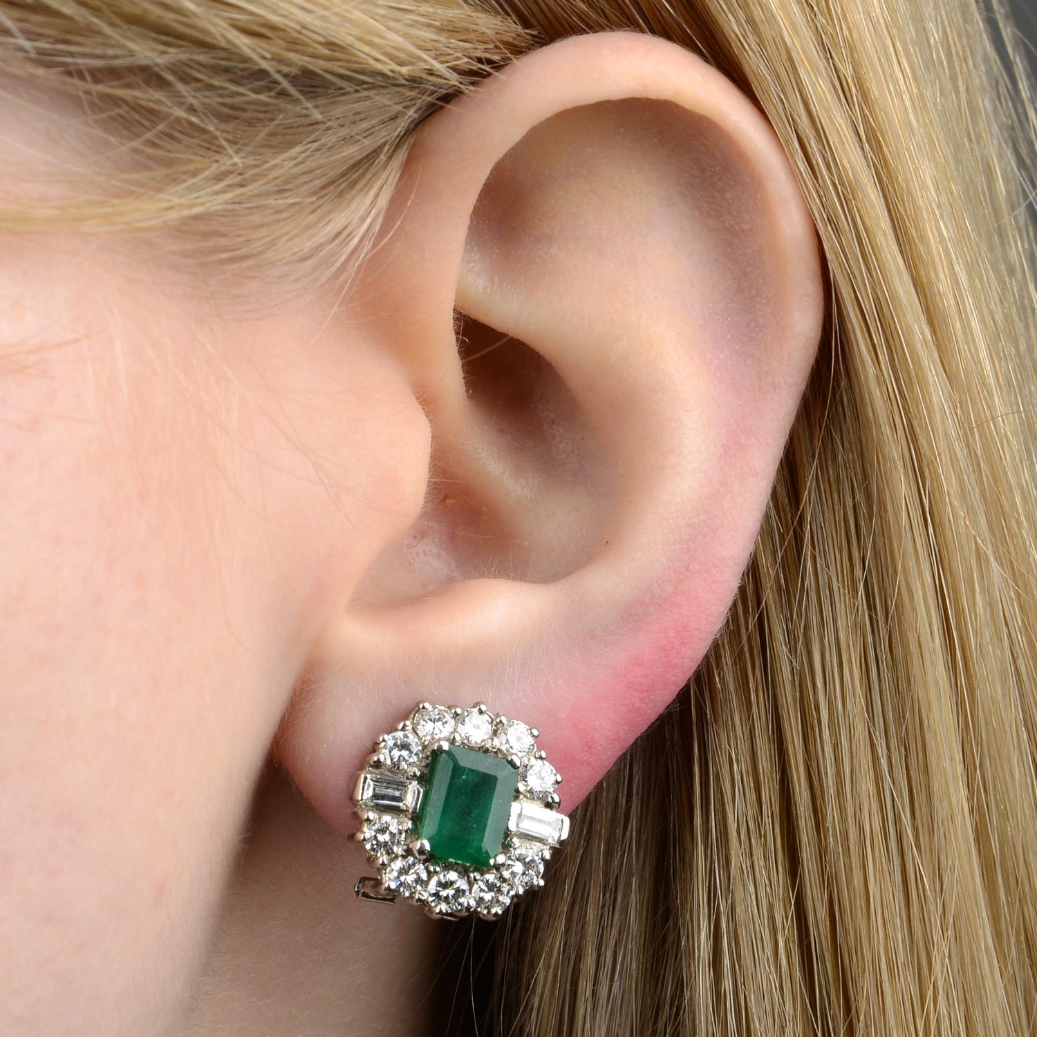 A pair of 18ct gold emerald and vari-cut diamond cluster earrings.Estimated total diamond weight