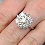 A brilliant and baguette-cut diamond cluster ring.Estimated total diamond weight 3.40cts,