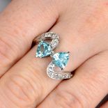 A platinum paraiba tourmaline two-stone crossover ring,