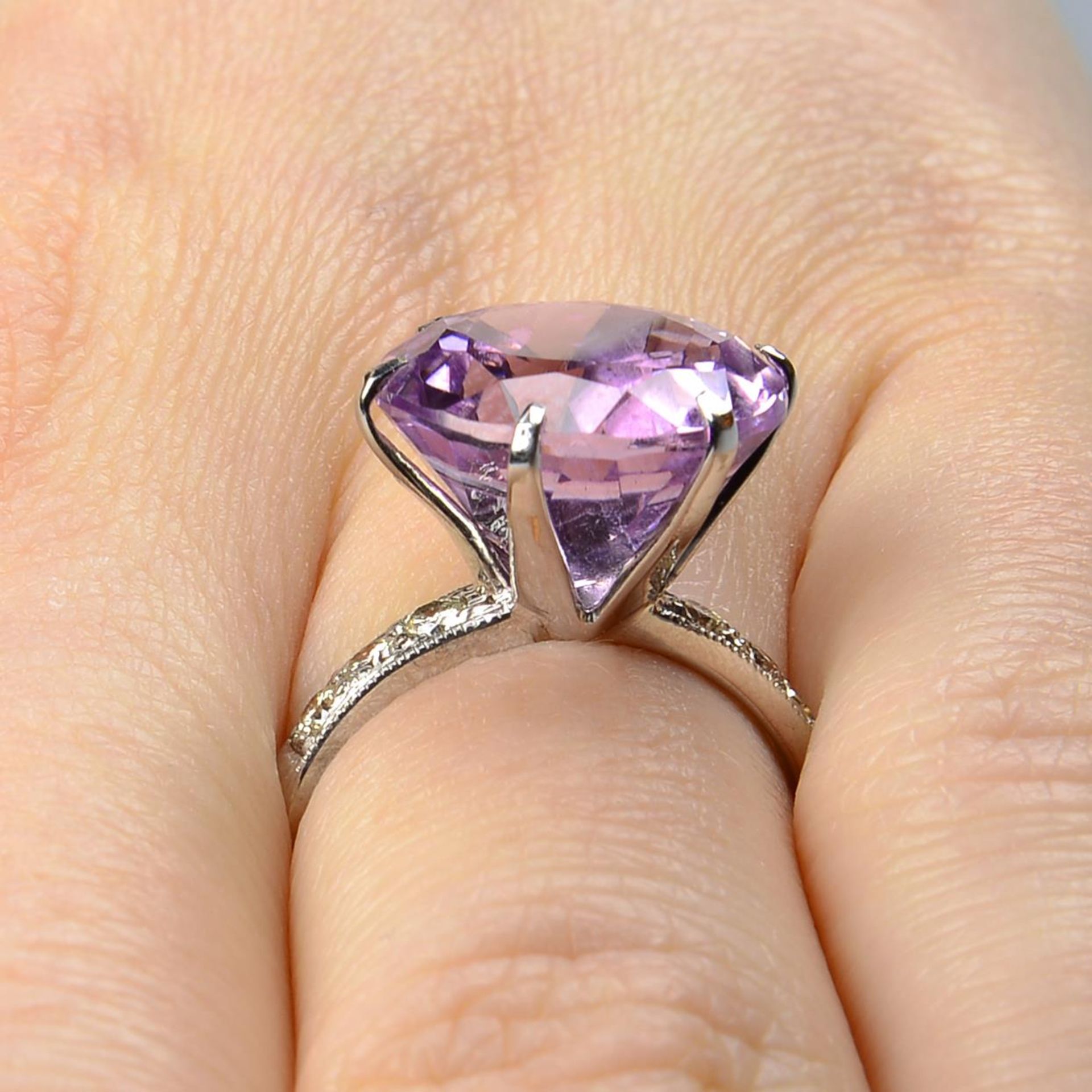 A kunzite single-stone ring, with diamond shoulders. - Image 6 of 6