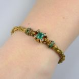 An early Victorian gold emerald and diamond foliate bracelet.Principal emerald calculated weight