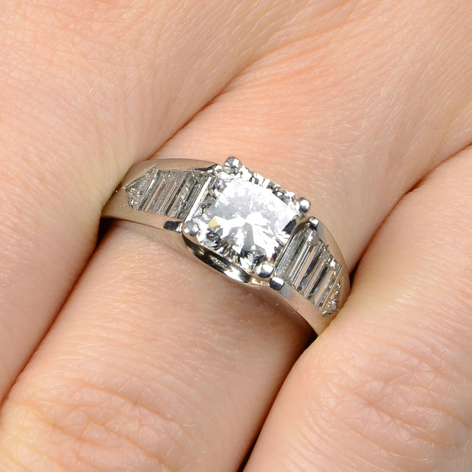 A square-shape diamond single-stone ring,