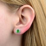 A pair of green garnet and brilliant-cut diamond cluster earrings.Estimated diameter of one garnet