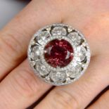 A pink tourmaline and diamond floral cluster dress ring.