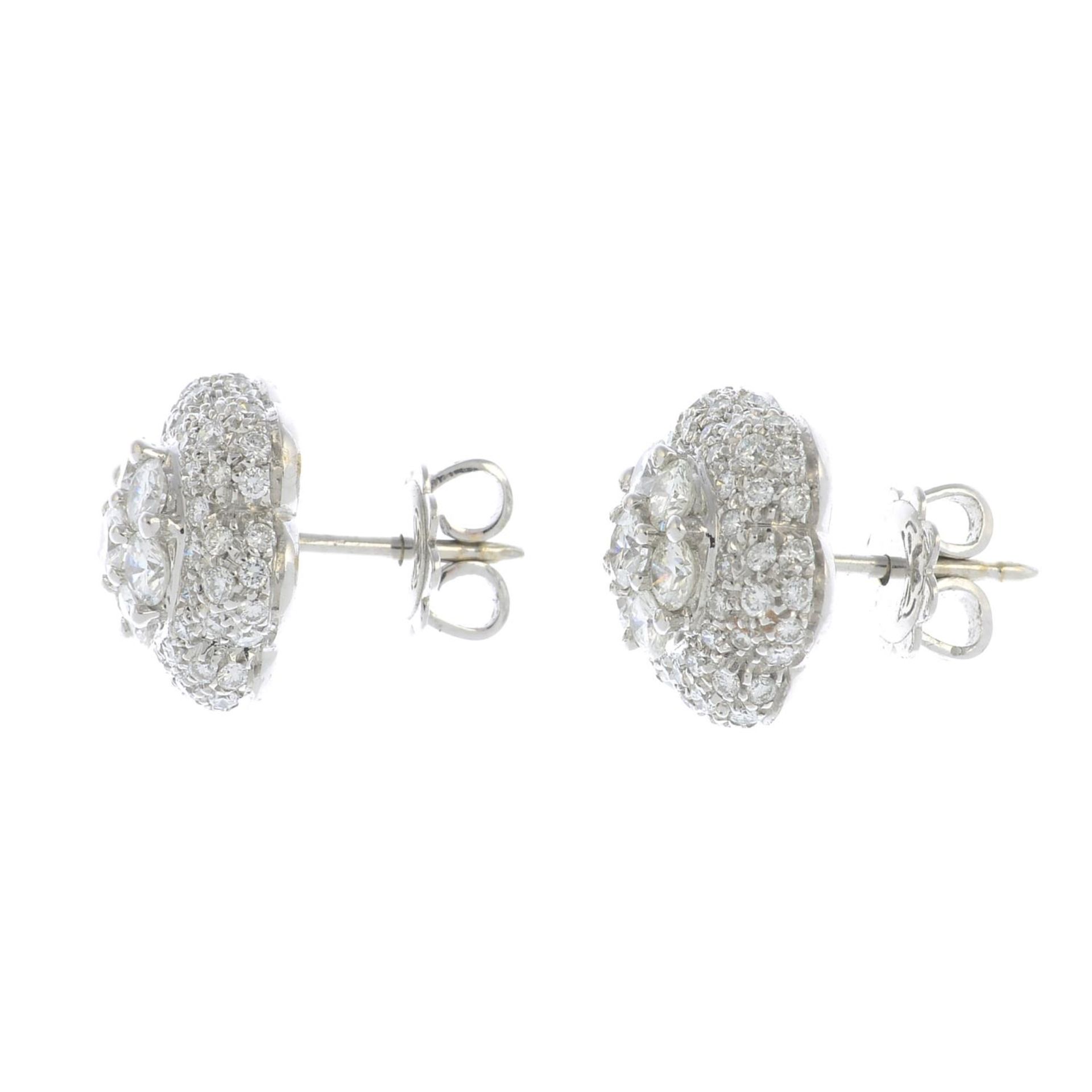 A pair of 18ct gold diamond floral cluster earrings. - Image 2 of 3