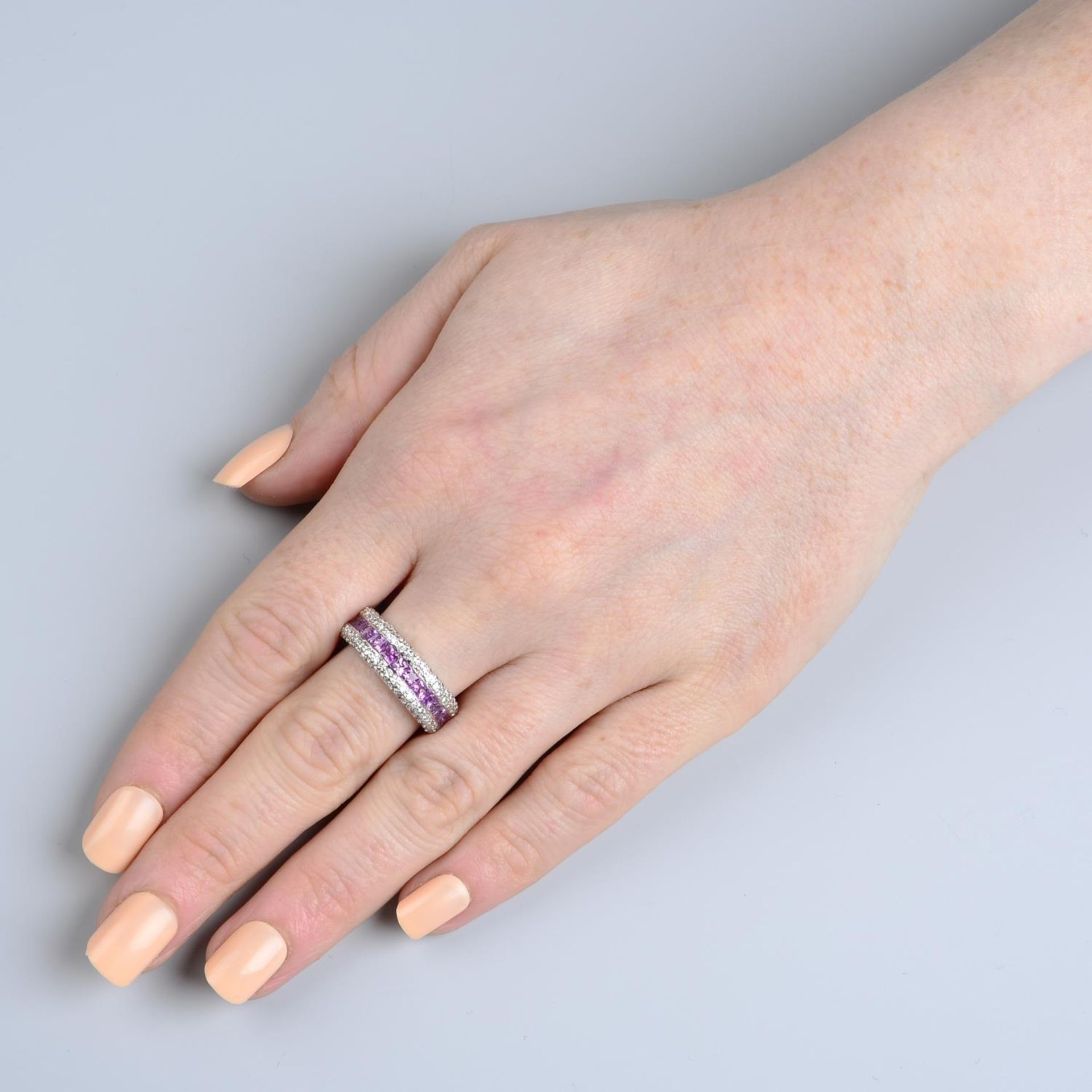 An 18ct gold square-shape pink sapphire half eternity ring, with pave-set diamond sides. - Image 5 of 5