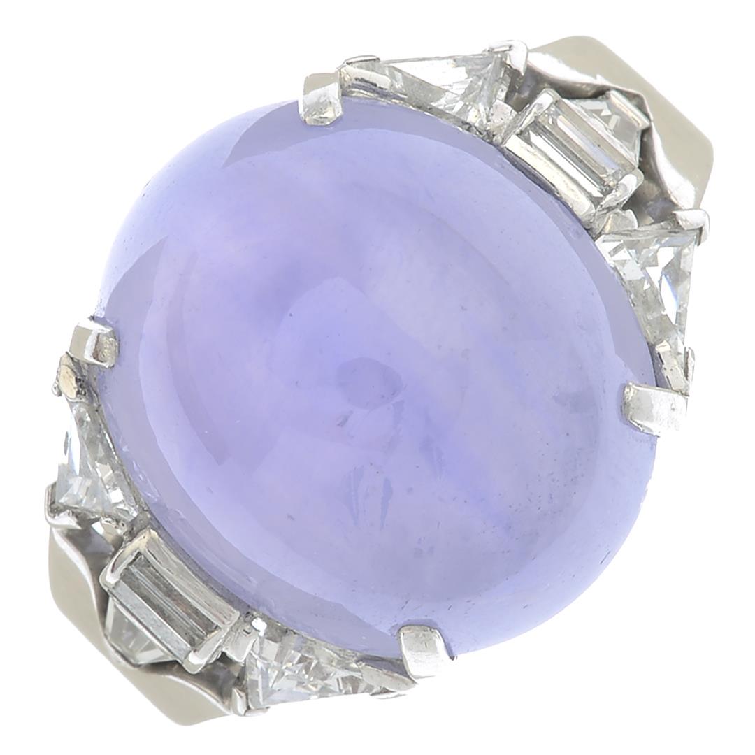 A star sapphire cabochon ring, with vari-cut diamond shoulders. - Image 5 of 6
