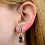 A pair of amethyst and diamond cluster drop earrings, by Buchwald.