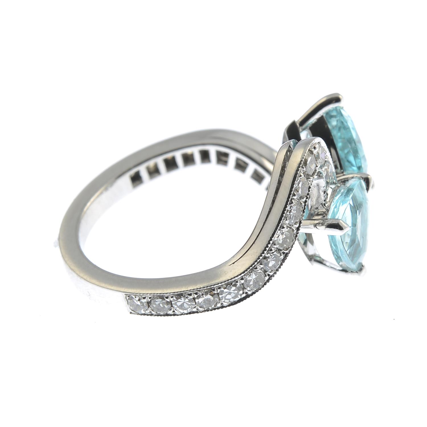 A platinum paraiba tourmaline two-stone crossover ring, - Image 3 of 6