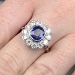A sapphire and old-cut diamond floral cluster ring.Sapphire calculated weight 1.70cts,