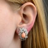 A coral and diamond foliate cluster pendant, with matching earrings.