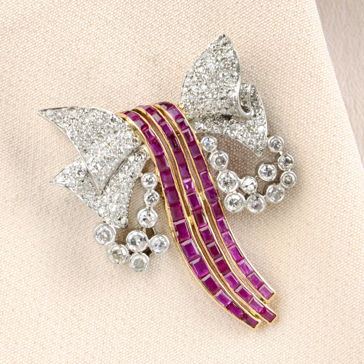 A mid 20th century platinum and 18ct gold ruby and diamond bow brooch.May be worn as a