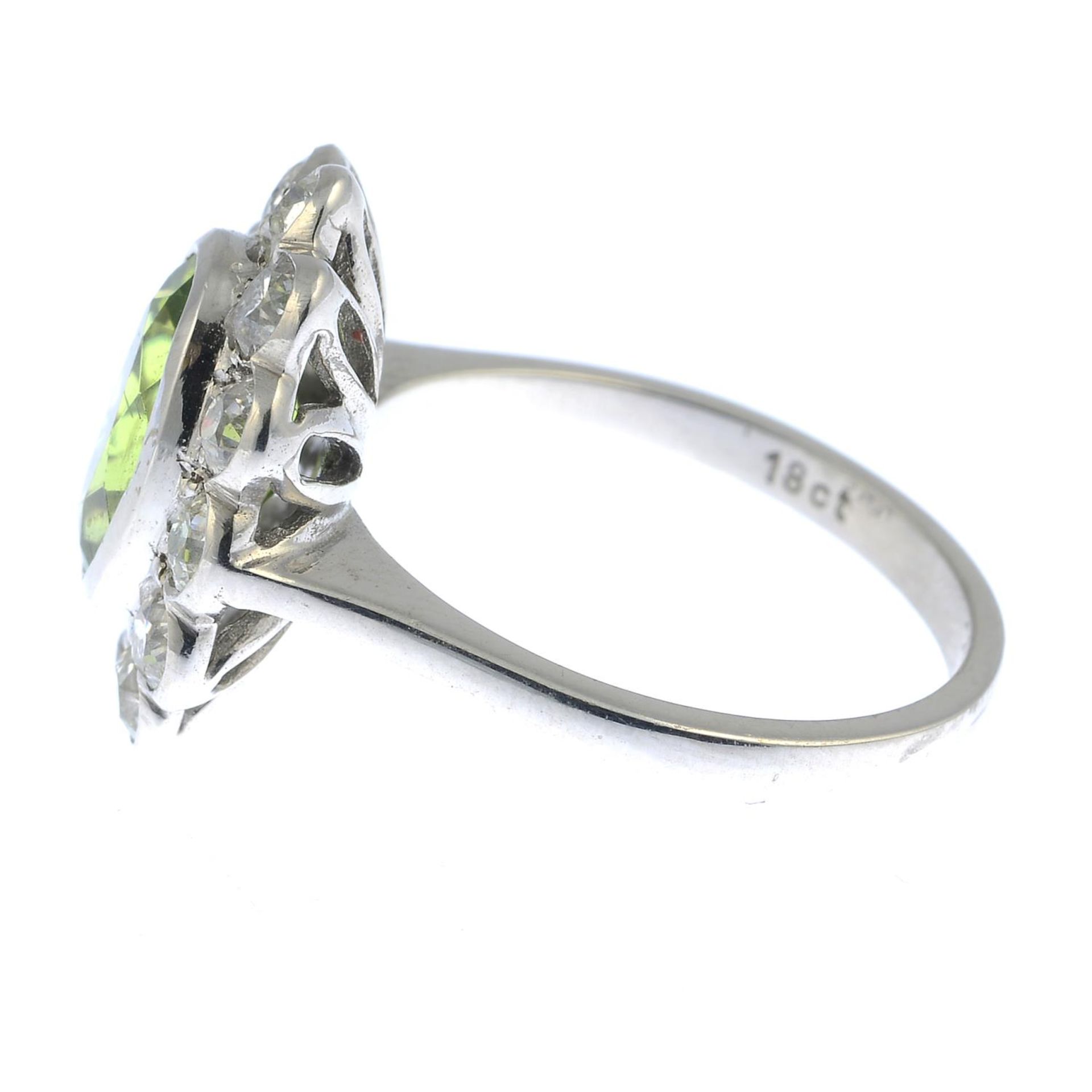 A peridot and old-cut diamond floral cluster ring. - Image 2 of 5