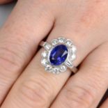 A platinum oval-shape Sri Lankan sapphire and vari-cut diamond ring.With report 10374,