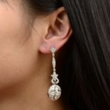 A pair of vari-cut diamond geometric floral earrings.Estimated total diamond weight 4cts,