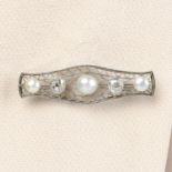 An Edwardian platinum pearl and old-cut diamond openwork brooch.