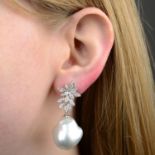 A pair of Baroque cultured pearl and brilliant-cut diamond earrings.Estimated total diamond weight