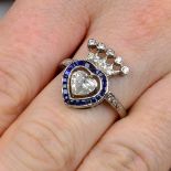 A sapphire and diamond crowned heart ring.Principal diamond estimated weight 0.75ct,