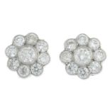 A pair of old-cut diamond floral cluster earrings.Estimated total diamond weight 2.40cts,