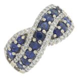 A sapphire and brilliant-cut diamond crossover dress ring.Estimated total diamond weight 0.55ct.