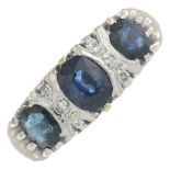 An 18ct gold sapphire and circular-cut diamond dress ring.Hallmarks for Sheffield,