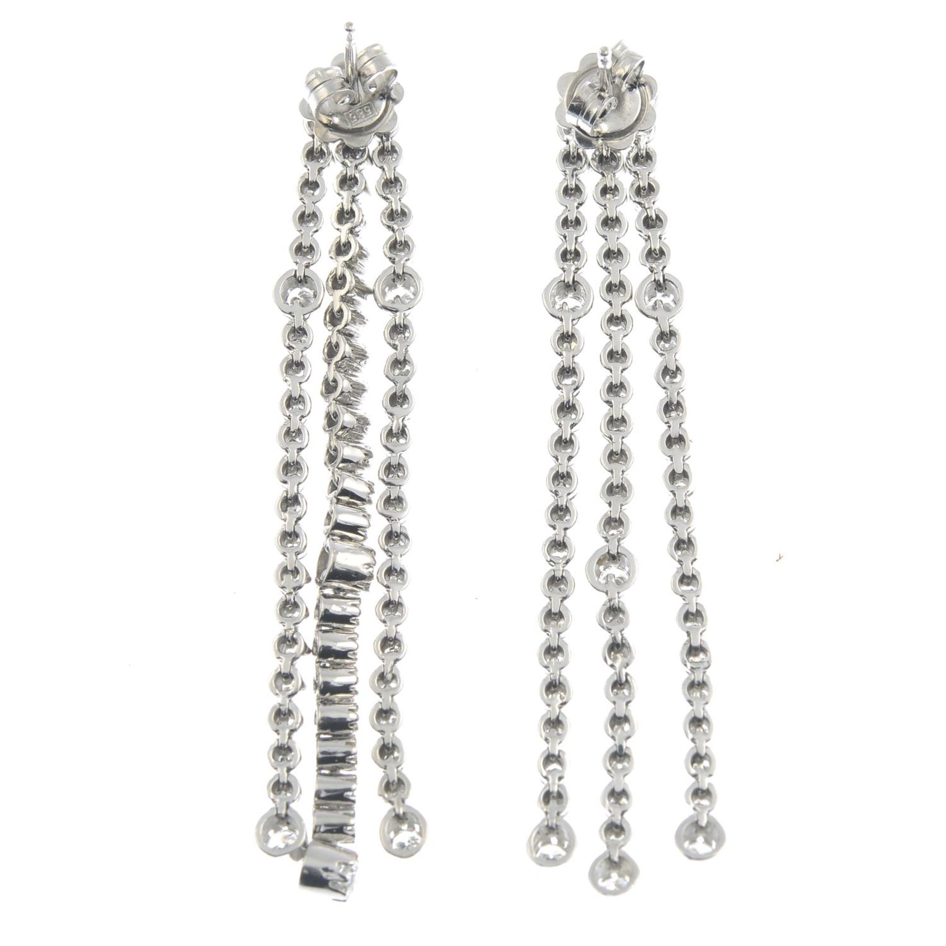 A pair of brilliant-cut diamond line drop earrings.Estimated total diamond weight 2cts, - Bild 2 aus 2