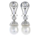 A pair of cultured pearl and brilliant-cut diamond drop earrings.Approximate cultured pearl