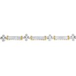 A 14ct bi-colour gold square-shape diamond bracelet.Estimated total diamond weight