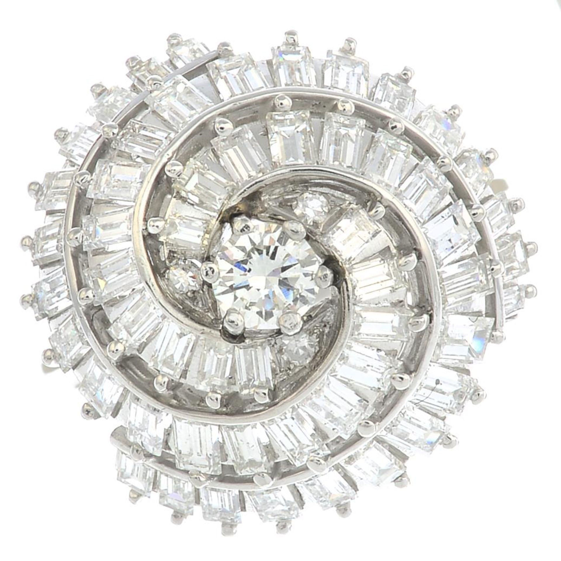 A vari-cut diamond dress ring.Estimated total diamond weight 2.75 to 3cts,
