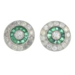 A pair of calibre-cut emerald and vari-cut diamond cluster earrings.Estimated total diamond weight