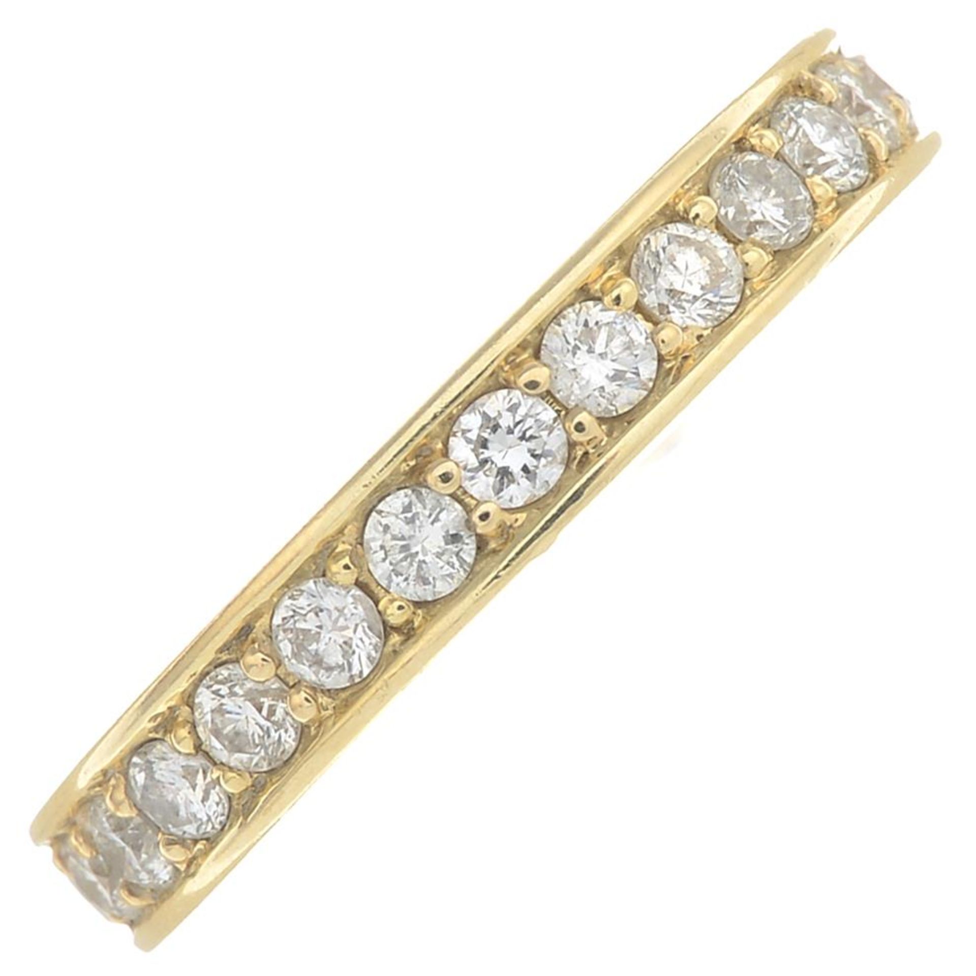 A brilliant-cut diamond half eternity ring.Total diamond weight 0.68ct,