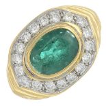 An oval-shape emerald and brilliant-cut diamond cluster ring.Emerald calculated weight 1.83cts,