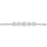 An 18ct gold diamond bracelet.Estimated total diamond weight 0.60ct,