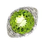 A peridot and single-cut diamond dress ring.Peridot calculated weight 4.84cts,