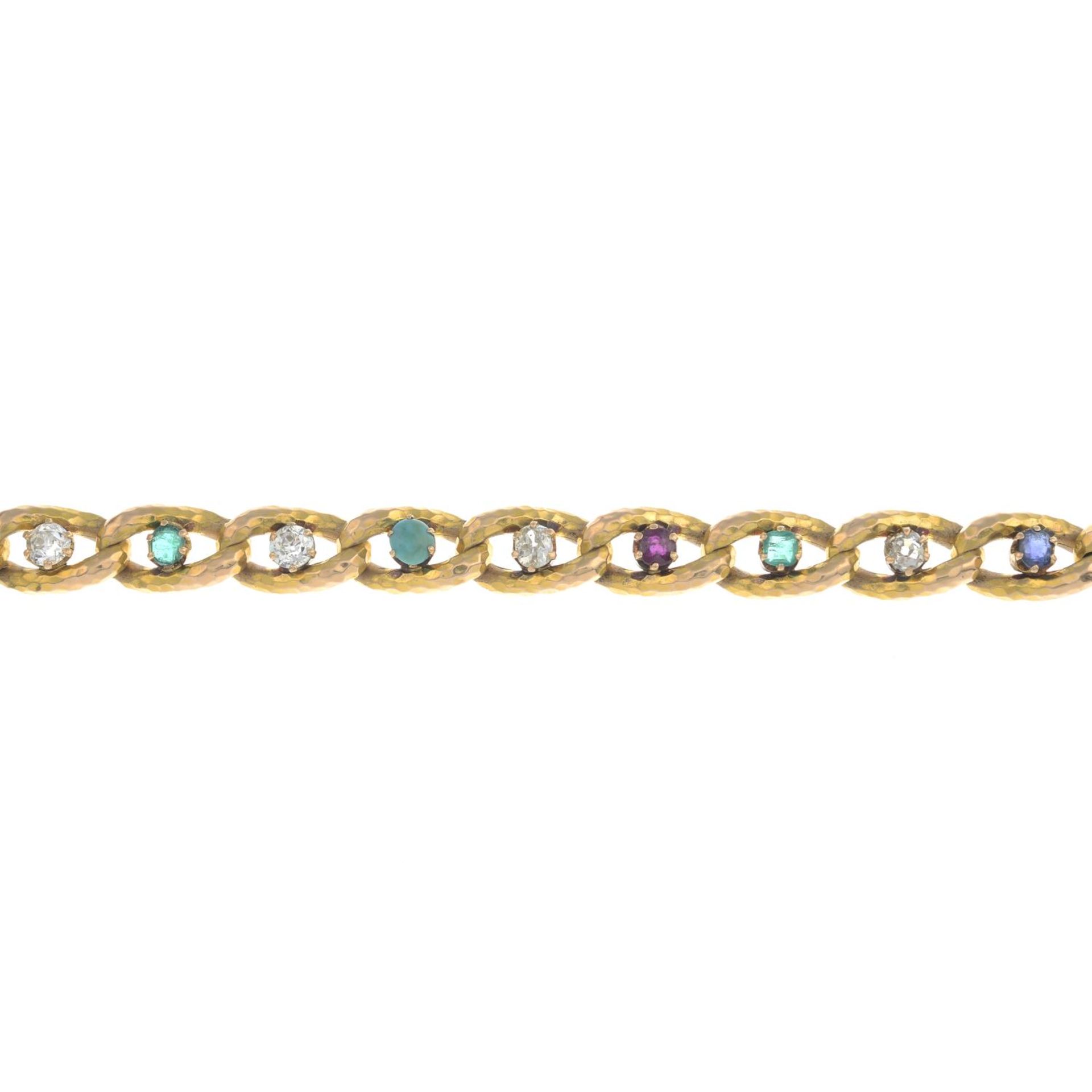 A vari-cut diamond and gem-set bracelet.Gems include ruby,